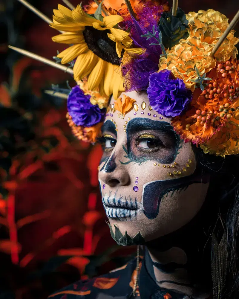 Retrato de catrina con corona de flores de colores