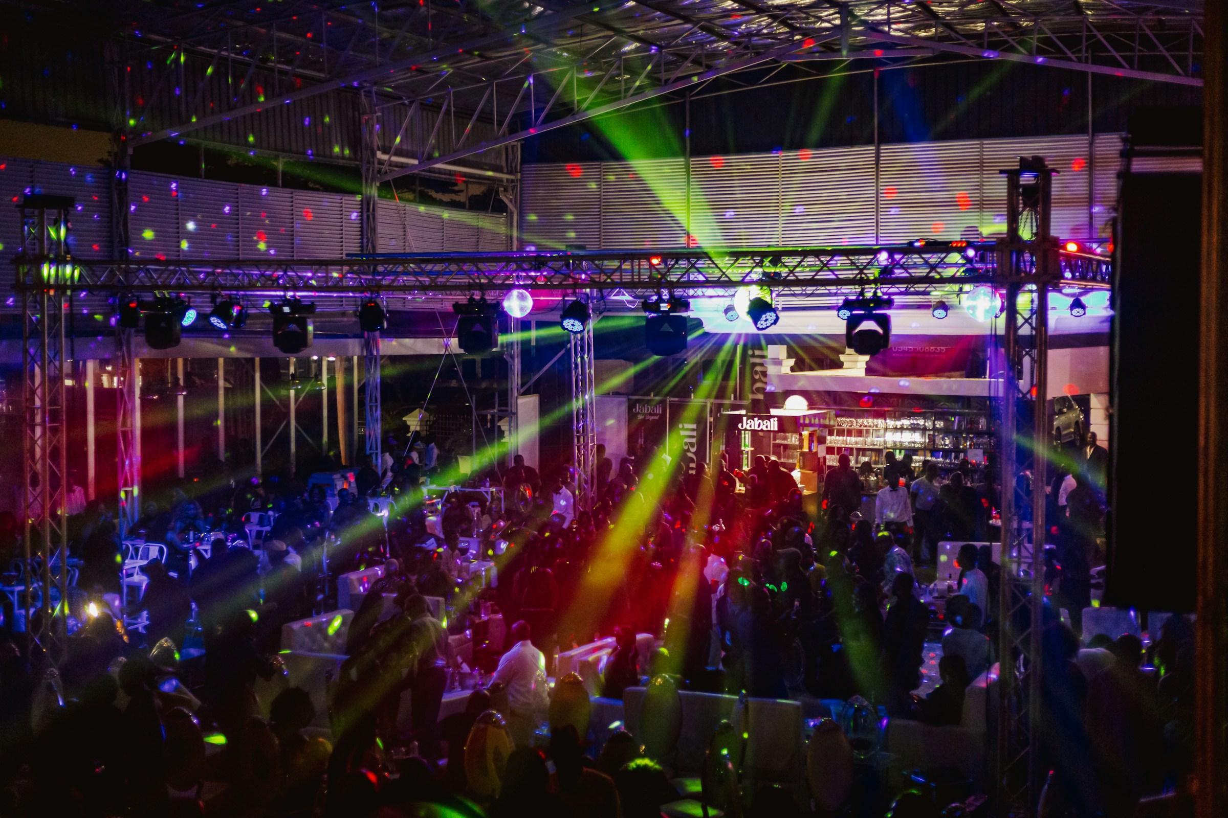 A corporate event with a DJ and a festive atmosphere.